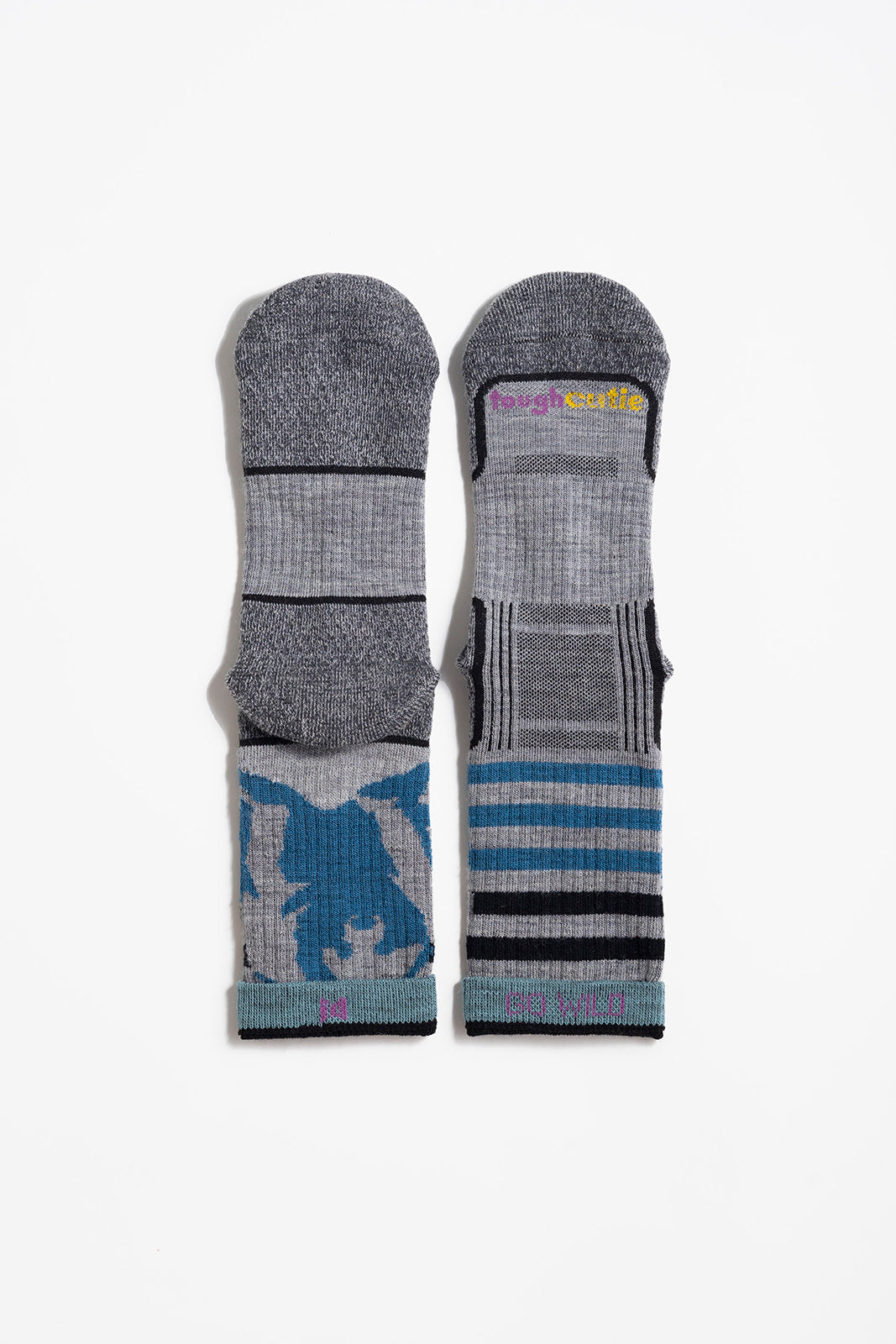 Multicolor (grey, blue haze, twilight blue and black) women's hiking sock featuring a black bear on the back and stripes on the front with the ToughCutie logo on the toe and size range/go wild message inside the welt