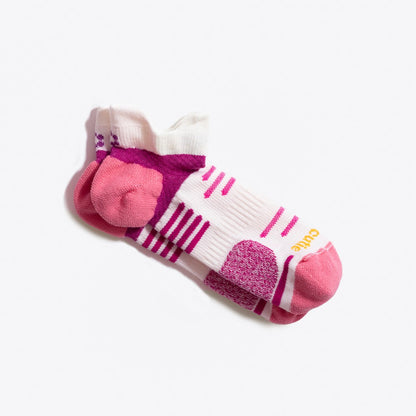 White, boysenberry and strawberry running sock laying flat with ToughCutie logo